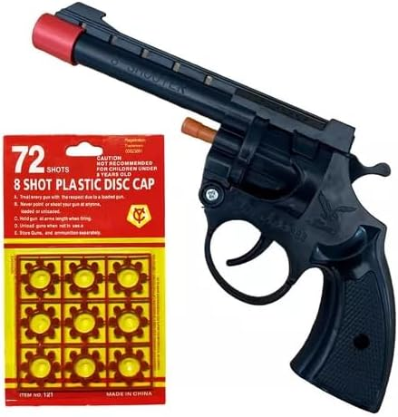 Revólver de brinquedo preto com ponta vermelha de identificação, ao lado da cartela de 72 espoletas.